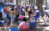 Steve, Marty, Gordy, Christopher, Bob, Joe, Steve and John and the girls play while Skyler dances
