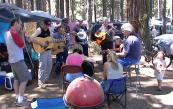 Steve, Marty, Gordy, Christopher, Bob, Joe, Steve and John and the girls play while Skyler dances